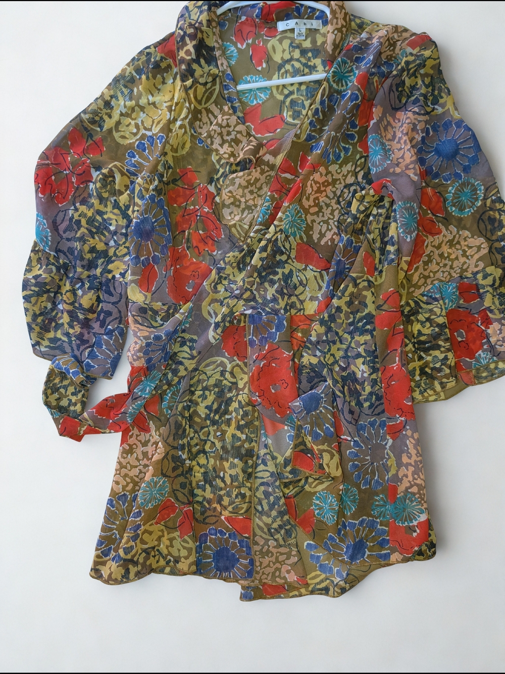 CAbi Floral Wrap Top in Tan, Blue & Red